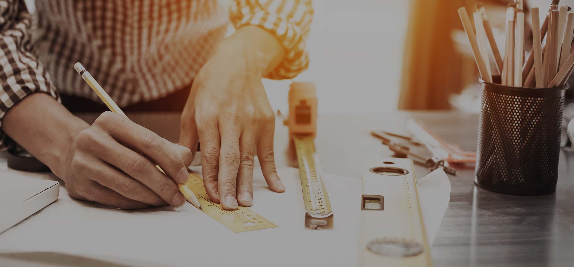 contractor drawing home improvement designs, construction plans